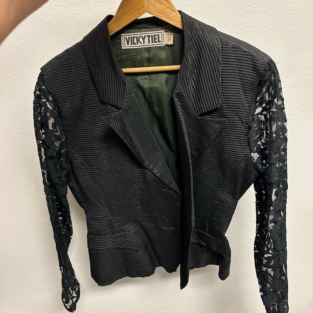 Black Blazer with Classic Lapel and Textured Sleeves